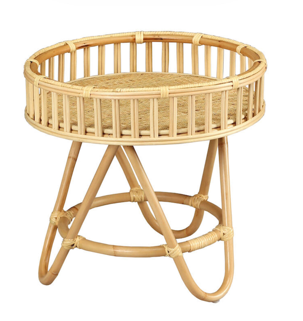 The Tika Accent Table is a small round table with a fixed tray top made from wrapped rattan and woven rattan caning.  The material, which is not for outdoor use, is sustainable and durable materal and will last for generations when cared for properly.  Item Depth22 Item Height21 Item Weight6.6 Primary Color/FinishNatural Primary MaterialNatural Materials Primary Material Sub StyleRattan