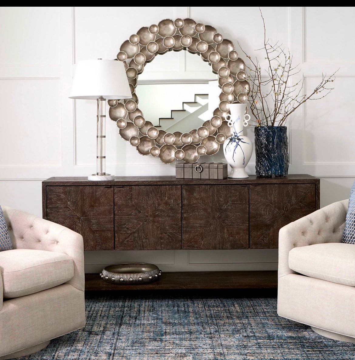 
The Gala mirror collection features a cast aluminum frame with varying sizes of concave disks that overlap in a hypnotic pattern, creating a dynamic and multidimensional aesthetic that commands attention. Available in antique brass or antique aluminum finish options, these mirrors offer versatility to complement any decor style.


Dimensions:
Dia 45 X H 45.75 X Ext 4
Weight:
63.0 lbs
Finish:
Antique Nickle
Mounting:
One Vertical Keyhole & Cleat