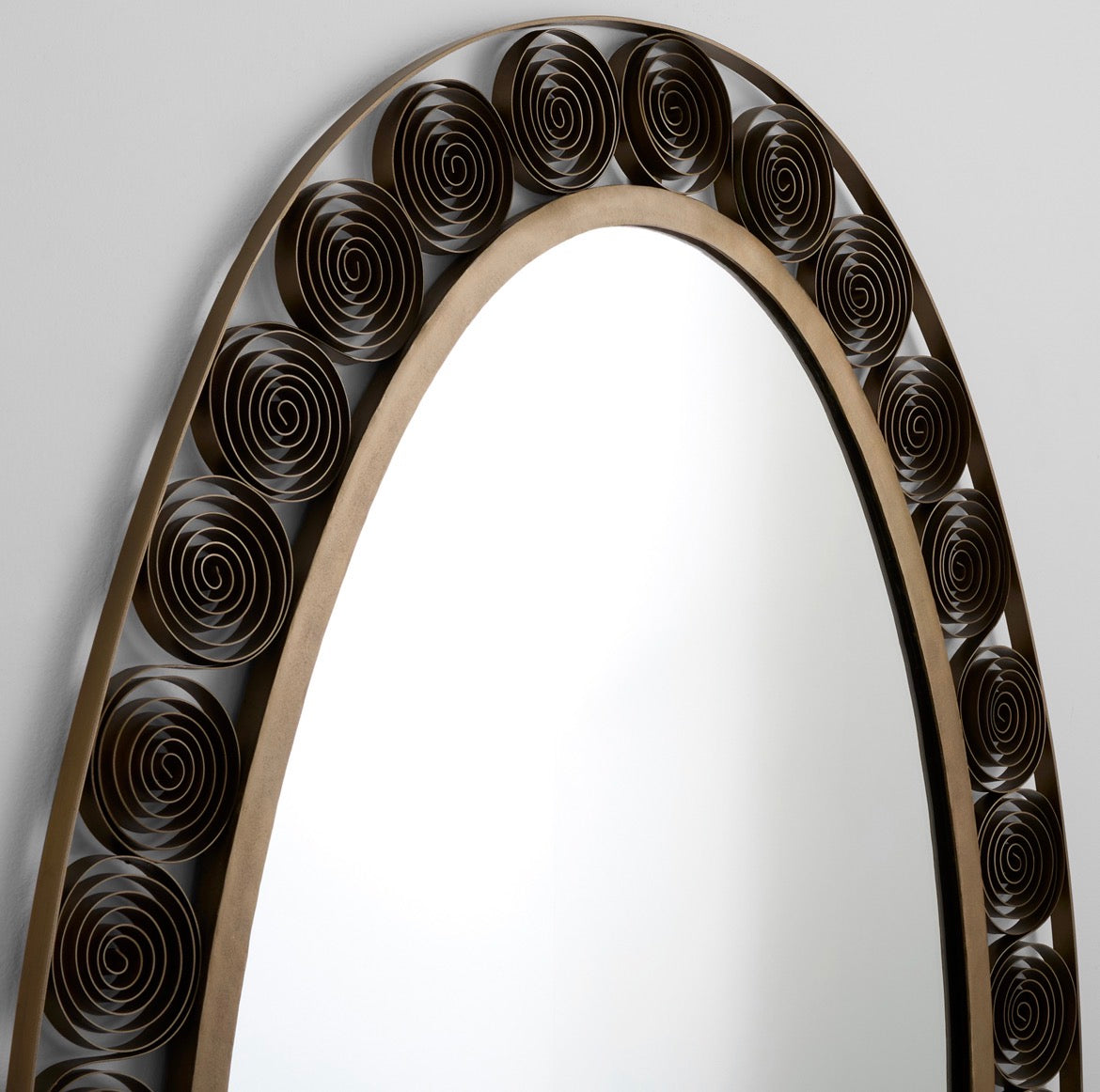Spiro Mirror | Torched Brass

The Spiro Mirror blends strength with delicate craftsmanship. Handcrafted steel coils create an intricate oval frame design. A brass filet connects the frame to the glass, while a torched brass finish adds warmth. Each coil is individually crafted, making every mirror a unique piece of art.
Dimensions:
L 60 x W 36 x D 1
Weight:
47.75 lbs
Finish:
Torched Brass
Materials:
Mild Steel | Mirrored Glass
Mounting:
One