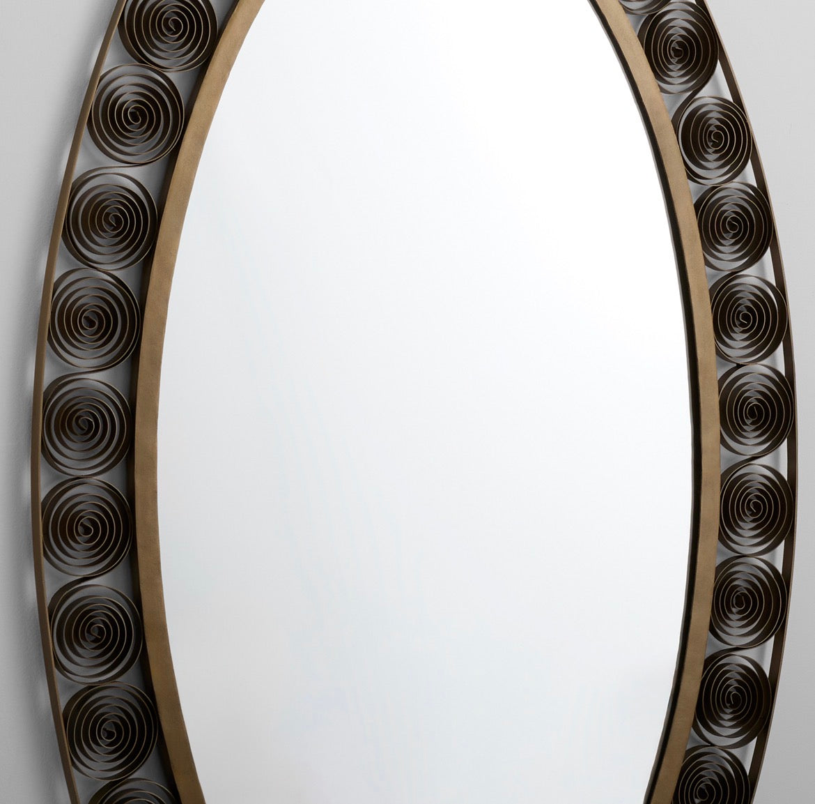 Spiro Mirror | Torched Brass

The Spiro Mirror blends strength with delicate craftsmanship. Handcrafted steel coils create an intricate oval frame design. A brass filet connects the frame to the glass, while a torched brass finish adds warmth. Each coil is individually crafted, making every mirror a unique piece of art.
Dimensions:
L 60 x W 36 x D 1
Weight:
47.75 lbs
Finish:
Torched Brass
Materials:
Mild Steel | Mirrored Glass
Mounting:
One