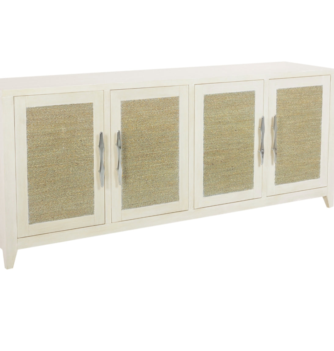 The Joyner 4-Door Credenza is ideal for adding texture and depth to a coastal or organic inspired room. Made from wood and accented with wicker insets, it comes in a bleached wood finish, giving it a fresh modern look. Its ample cupboard compartments are concealed behind four doors, making it ideal for storing household items discreetly.