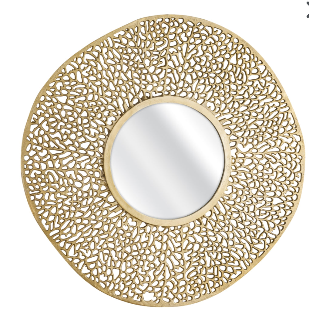 The Azoni Wall Mirror features a wide solid cast metal round frame that introduces captivating visual texture to your wall. Crafted from aluminum in two finishes, this mirror effortlessly combines elegance and innovation.