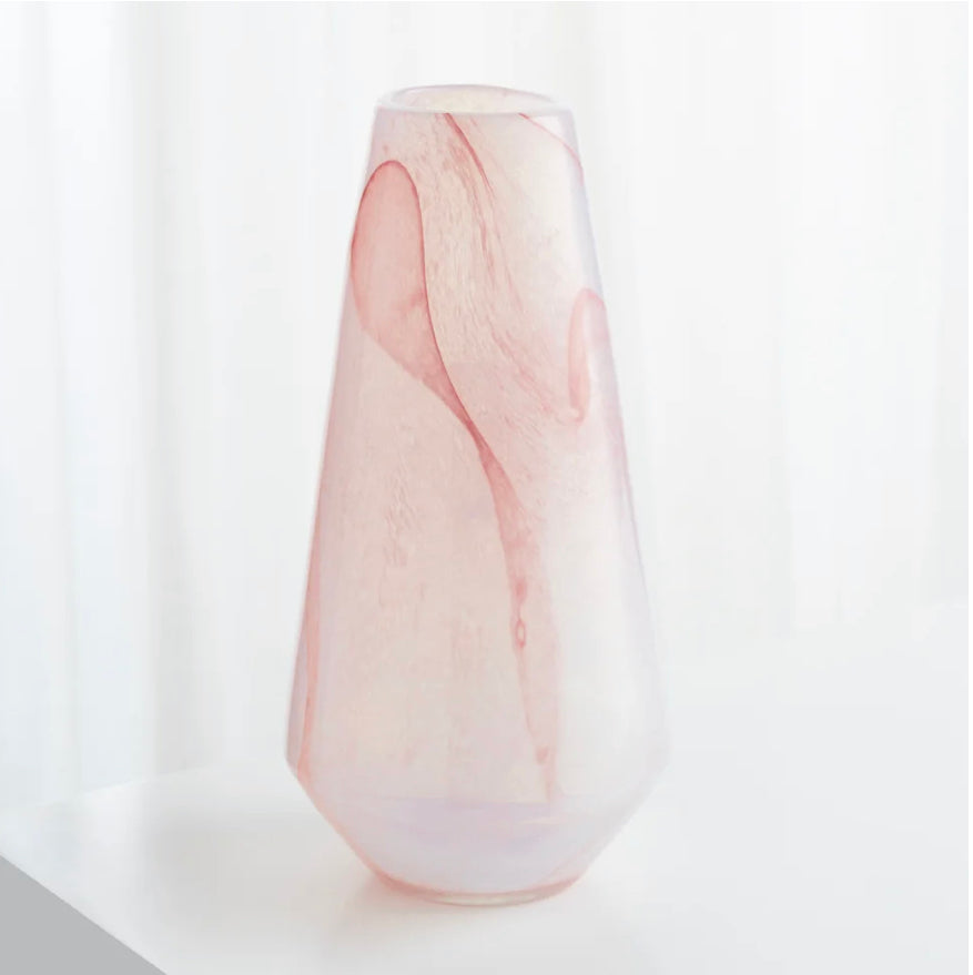   Atria Vase | Pink   The Atria vases are unique in their pink and cream color and are sure to make a statement to any room.    Dimensions: H 18 X Dia 8 Weight: 9.5 lbs. Large  Dimensions: H 11 X Dia 8.5 Weight: 8.6 lbs. Medium  Dimensions: H 13.75 X Dia 7 Weight: 7.81 lbs. Small  Finish: Pink Materials: Glass