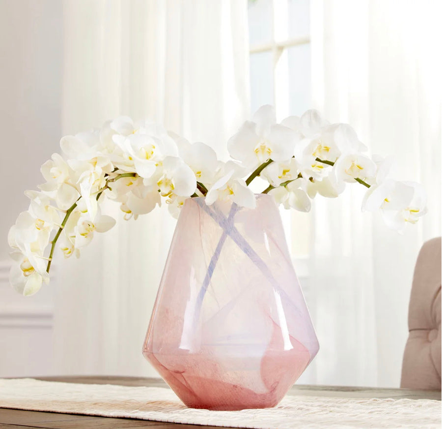    Atria Vase | Pink   The Atria vases are unique in their pink and cream color and are sure to make a statement to any room.    Dimensions: H 18 X Dia 8 Weight: 9.5 lbs. Large  Dimensions: H 11 X Dia 8.5 Weight: 8.6 lbs. Medium  Dimensions: H 13.75 X Dia 7 Weight: 7.81 lbs. Small  Finish: Pink Materials: Glass