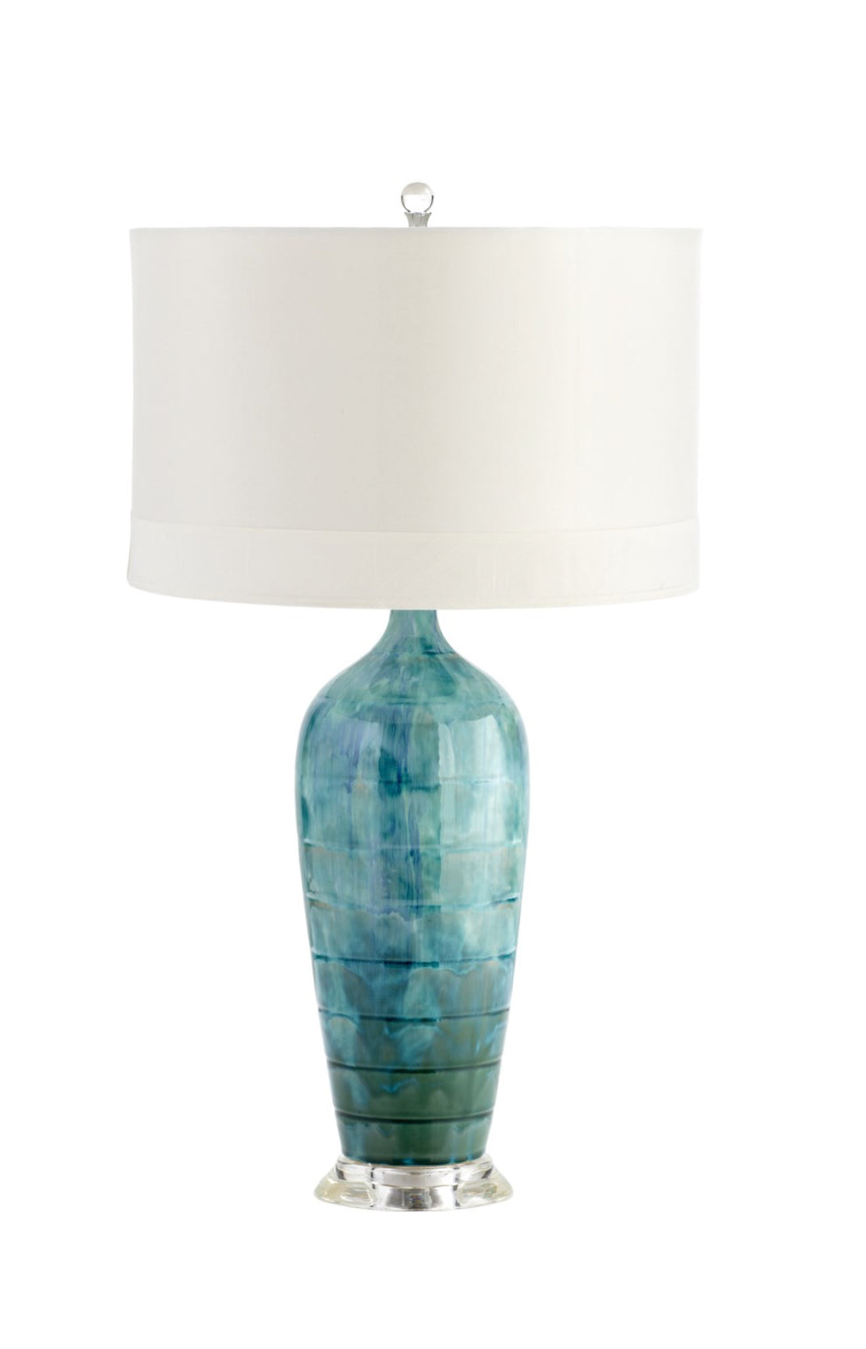 An exquisite addition to a refined living area or bedroom, this table lamp features a clear base and a familiar silhouette that combine to create an artful but approachable aesthetic.  Gorgeous blue glaze creates a multi-dimensional look for this marvelous ceramic table lamp.  A white shade with white lining delivers diffused, true illumination suitable for tasks and ambiance.  Dimensions: H 28.5 x Diameter 16  Finish: Blue Glaze  