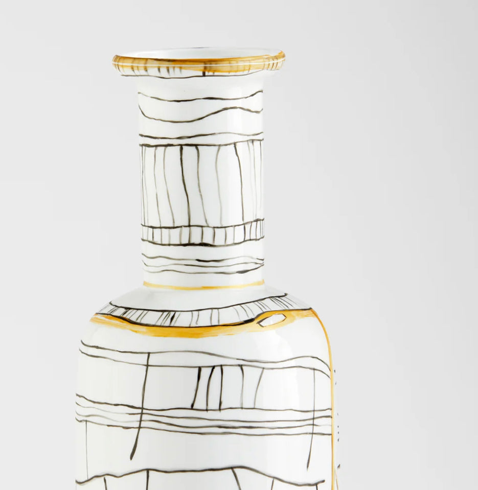 A glossy white base boasts irregular calligraphic lines with gold metallic embellishments, giving the Lindus vases an instinctively artful overture. Intersecting lines weave together to create a display of rudimentary elegance on a slender, cylindrical body. The Lindus vases are composed of ceramic and are available in three sizes.  Artisan Produced: Design of random caligraphic lines with gold metalic embellishments.  Dimensions: L 5.75 X W 5.75 X H 23.25 X Dia 5.75
