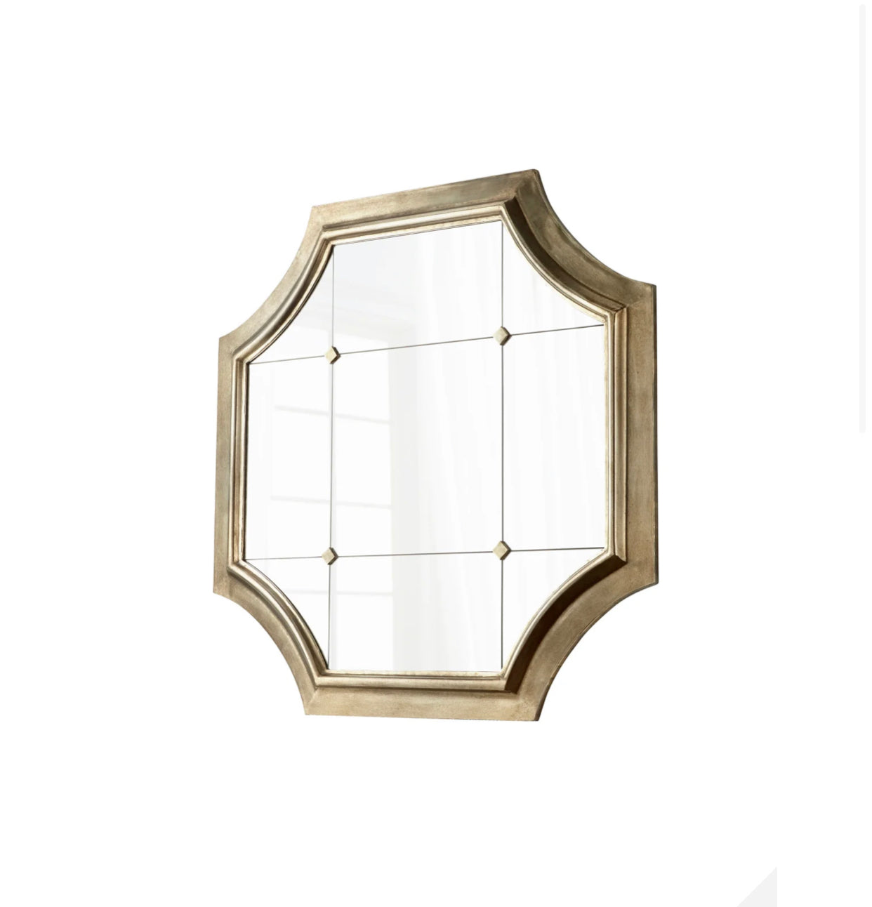 Vasco Mirror | Silver  "Crafted in iron, this classic wall mirror features a traditional quatrefoil silhouette. Complete with crossed accents over mirrored glass, the piece features an iron frame in a silver finish. Beautifully decorative in a chic living room or stylish entry."  Dimensions: L 50.00 X W 50.00 X H 2.25  Weight: 52.45 lbs.  Finish: Silver Materials: Iron and Mirrored Glass