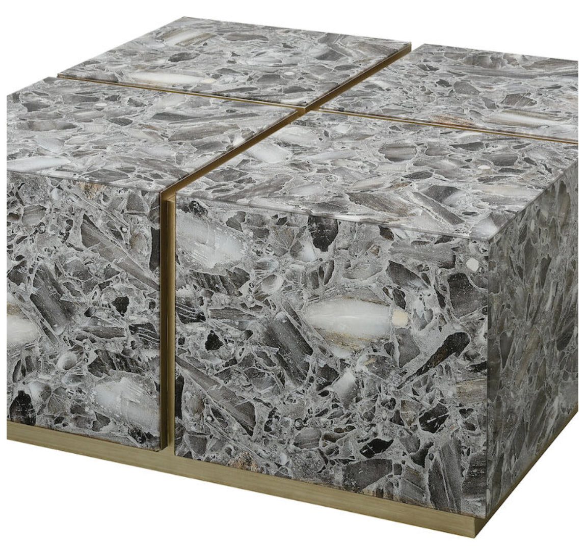 The Crystalline Coffee Table makes a sculptural statement. Featuring four squares of black agate, which are joined by a recessed frame of silver leaf metal, this table is glamorous and chic.  Primary Color/FinishGray Agate Primary MaterialGlass Secondary MaterialWood Composite Secondary Material Sub StyleMDF Item Width32.75 Item Depth32.75 Item Height16 Item Weight97.24